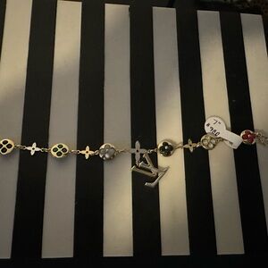 Gold and Silver Charm Bracelet